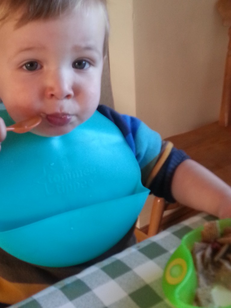 toddler eating breakfast