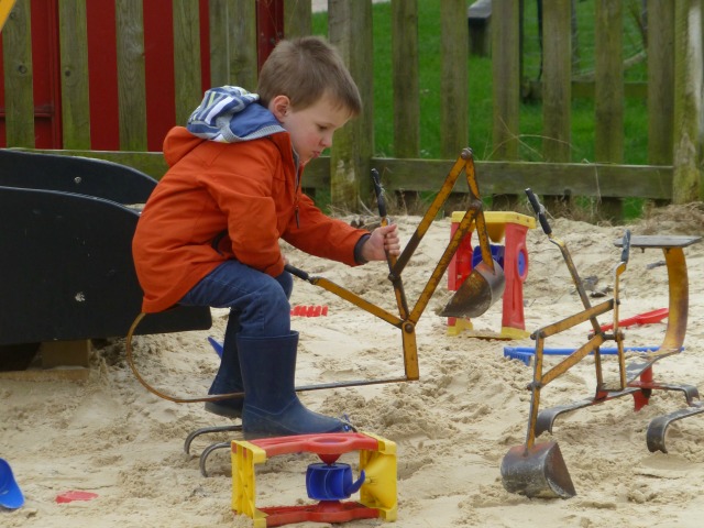 playing on the sandpit cranes