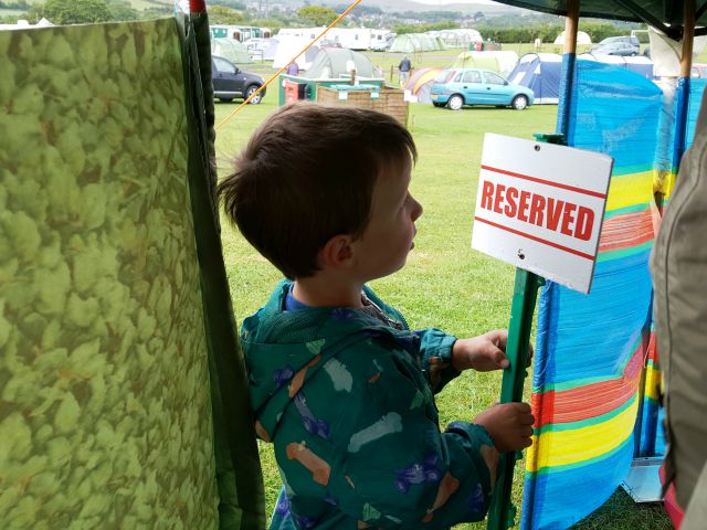 Under the gazebo with his favourite reserved sign