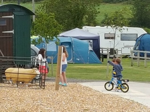 chatting up the older girls at the camp site