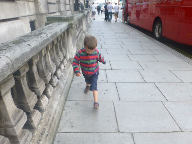striding to avoid the cracks on the pavement