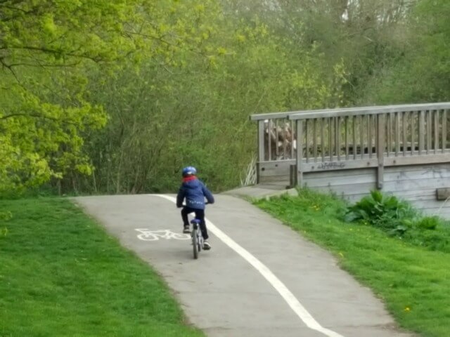 cycling uphill in Spiceball park