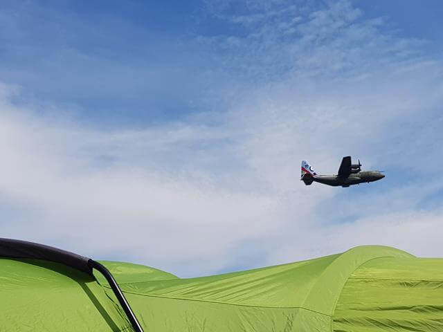 low planes over the tent