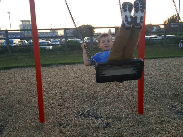 on the swings at southsea park
