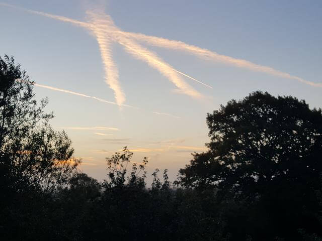 contrails in sunrise