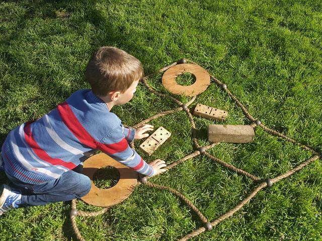 playing outdoor noughts and crosses