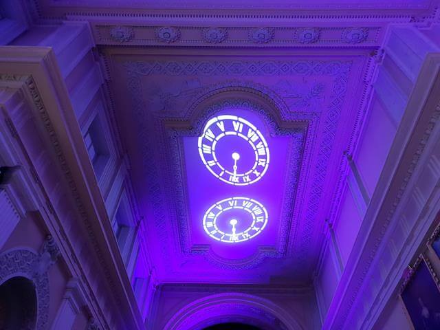 clocks on the ceiling projection