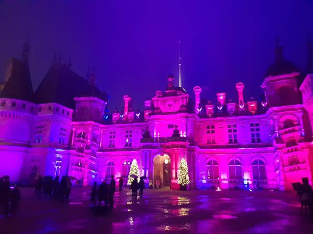 pink and purple lit up front of waddesdon