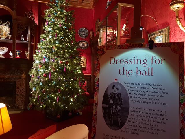 ready for the ball sign by smoking room christmas tree