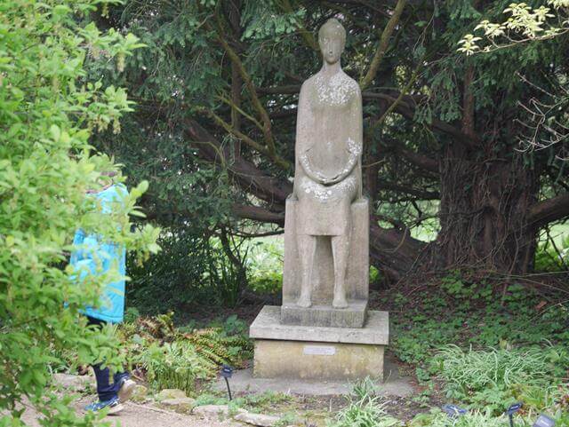 statue of sitting lady at waterperry gardens