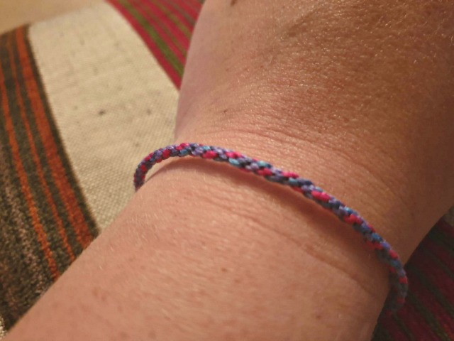 friendship bracelet the easy way in purples.