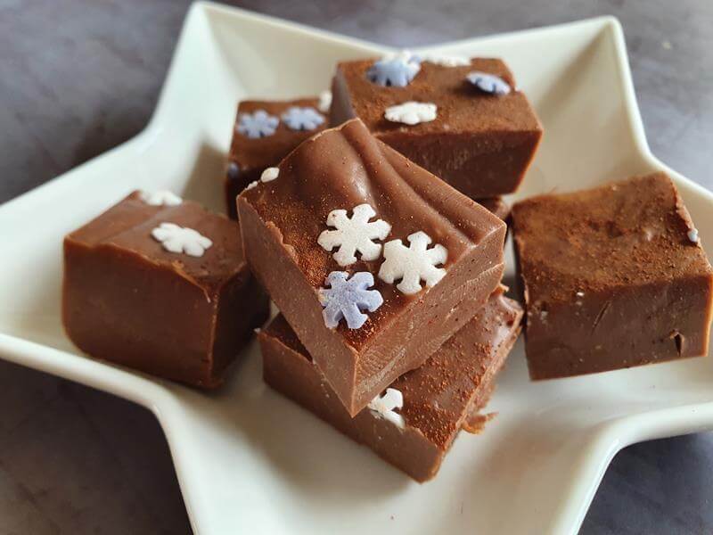 squares of gingerbread fudge on a star plate