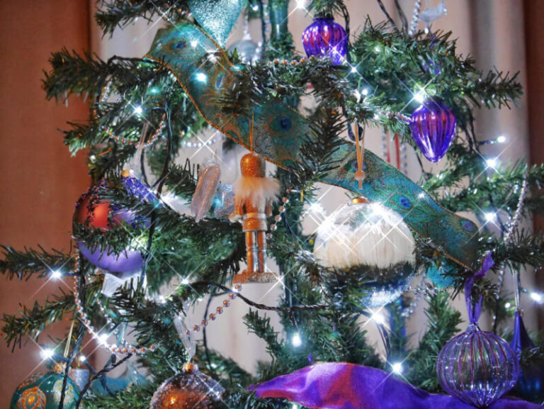 Close up of Christmas tree with sparkling lights and decorations