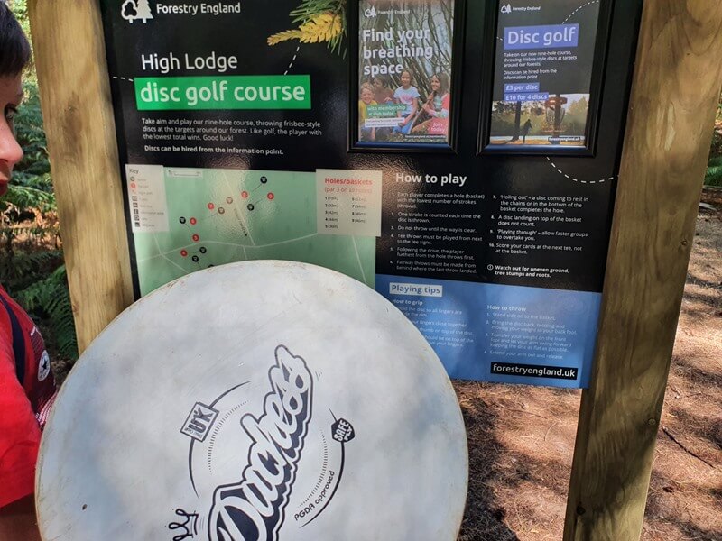 disc golf instruction board and disc