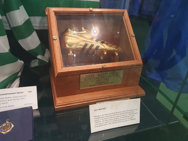 Ally McCoist's golden boot on display in a wooden case