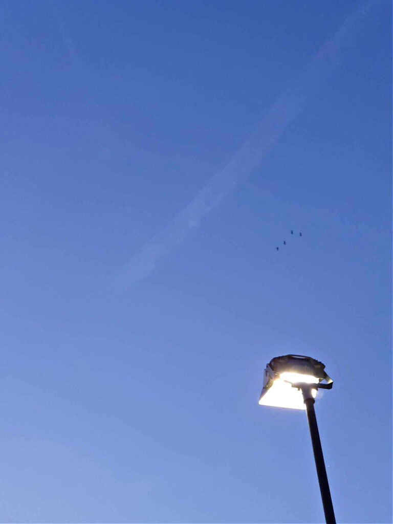 floodlight over dusk sky