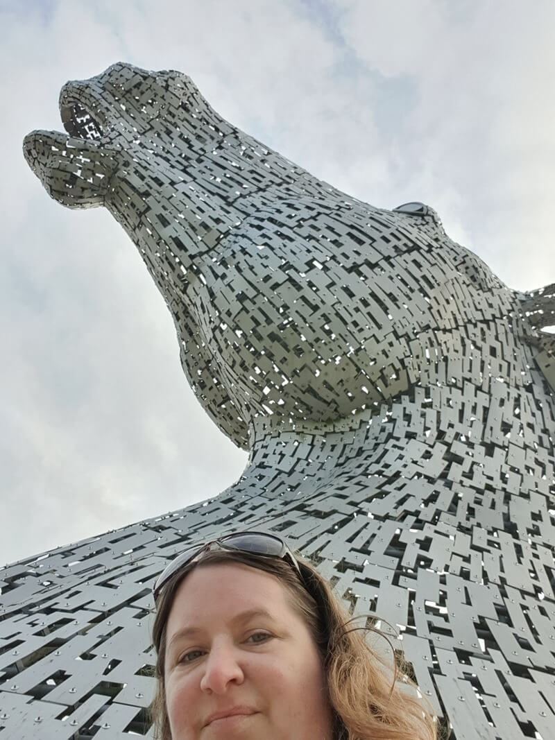 selfie looking up at the kelpie sculpture