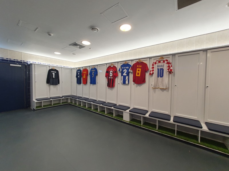 white lockers and football shirts in the away changing room at Hampden Park