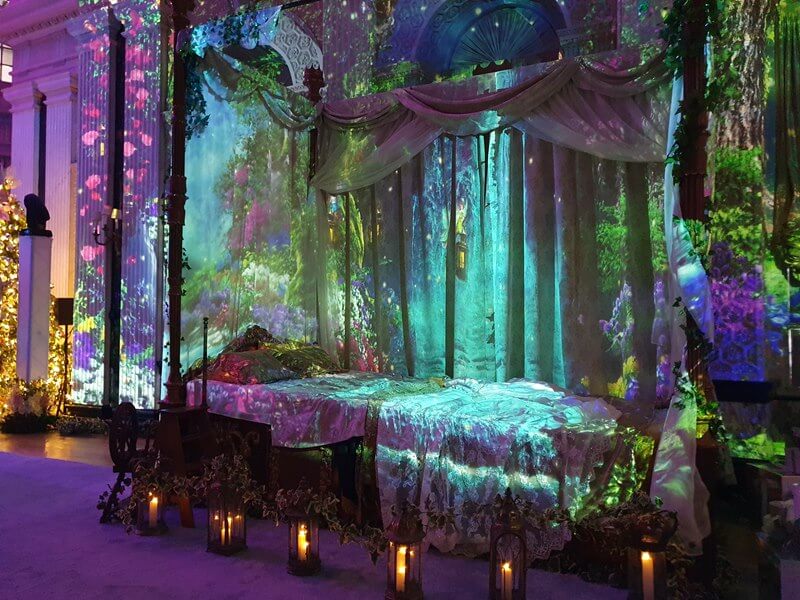 display of sleeping beauty bed with garden backgrounds
