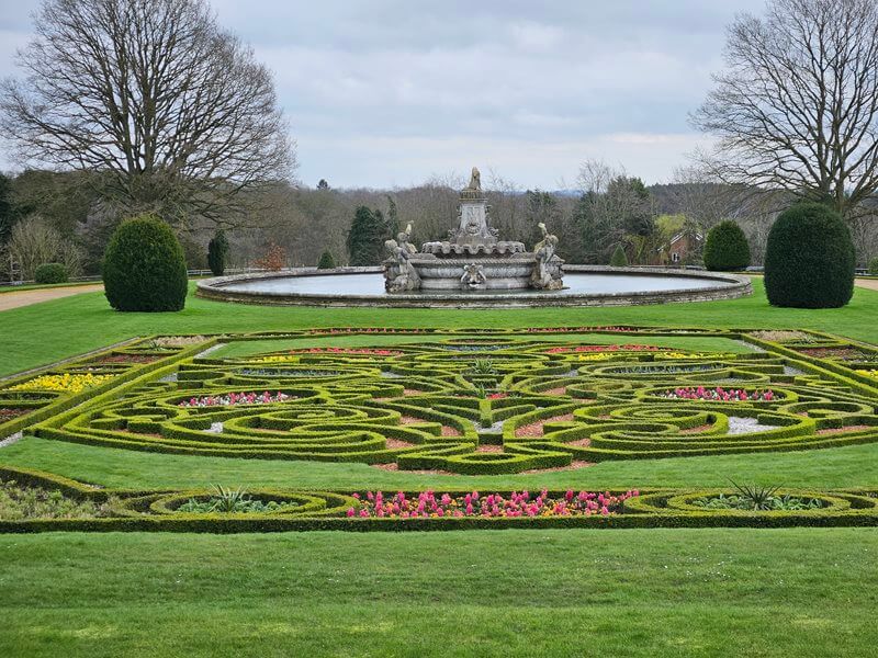 flowering parterre overlooking Flora and triton water fountain