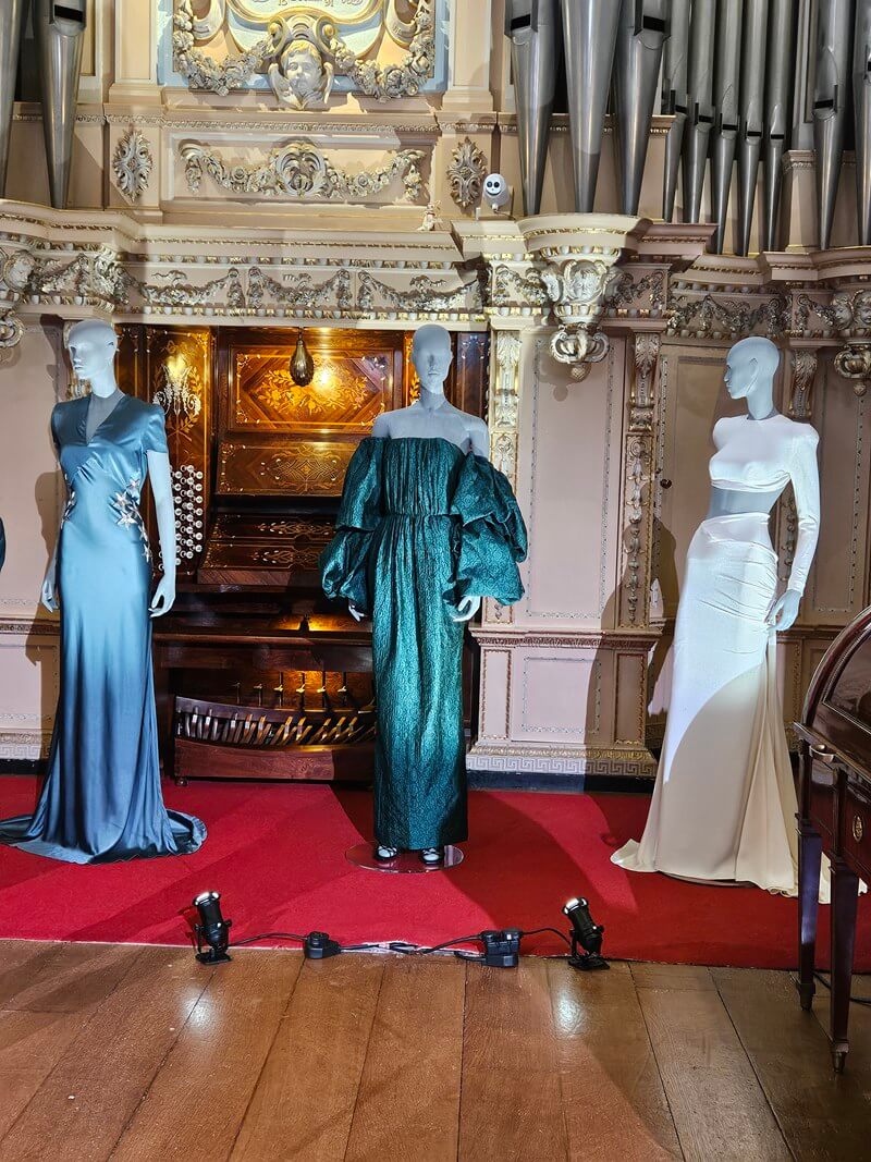Stella McCartney flowing evening gowns on display
