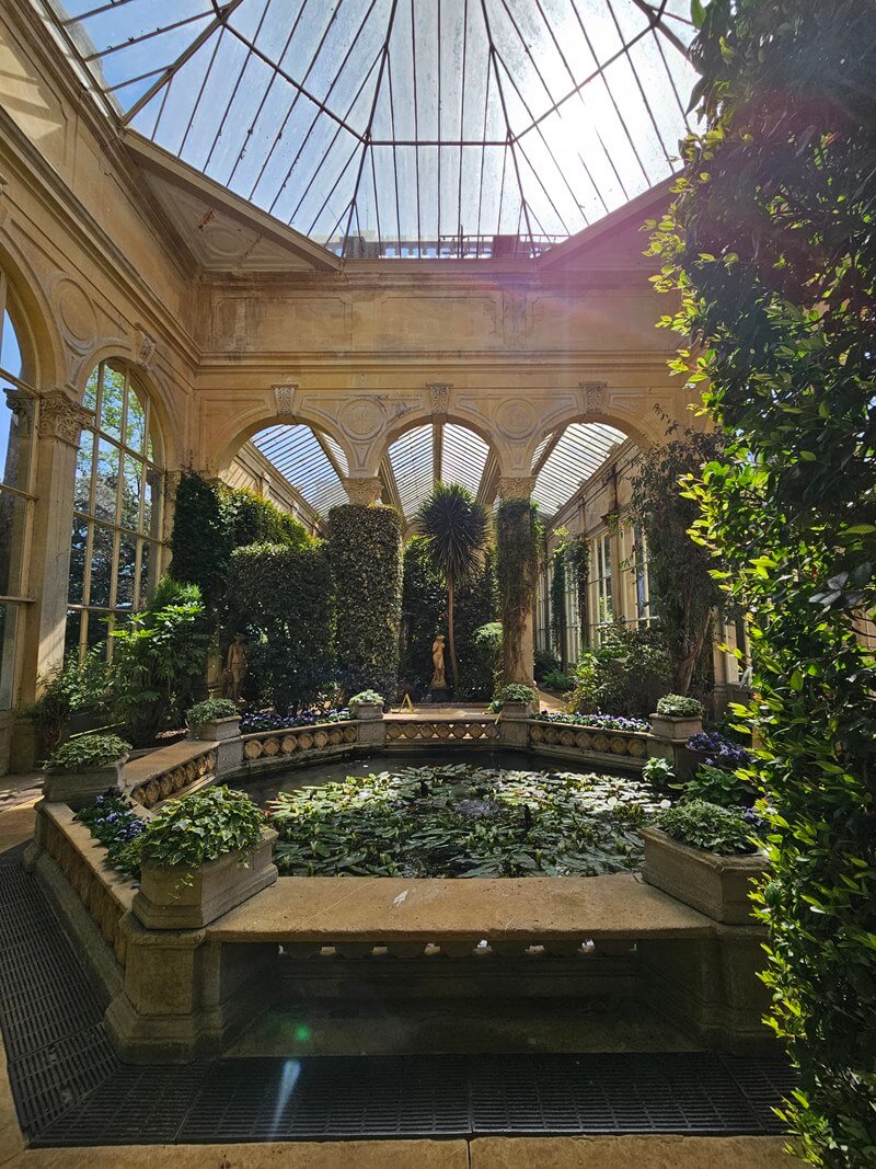 looking down inside the orangery with dome glass roof