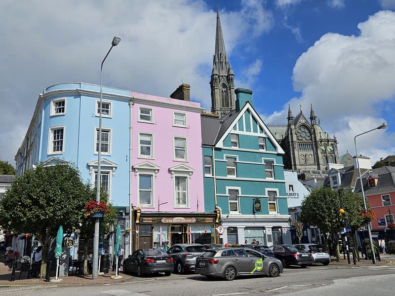 Cobh cathedral above colourful houses