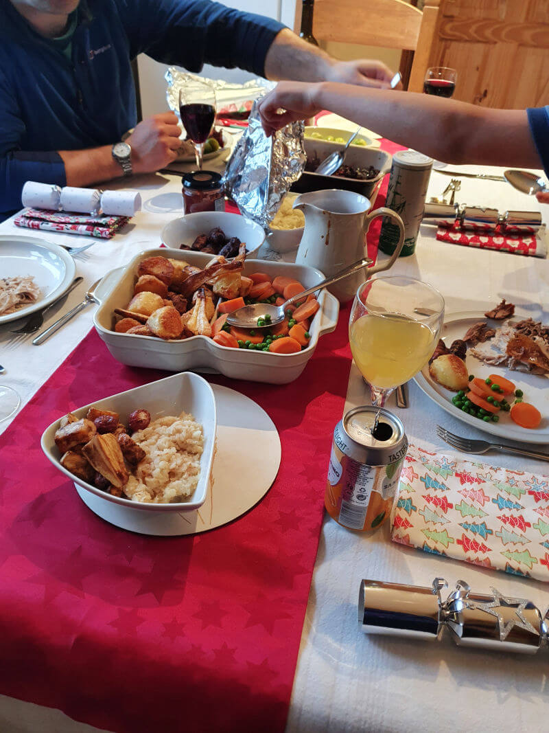 christmas dinner set up on the table