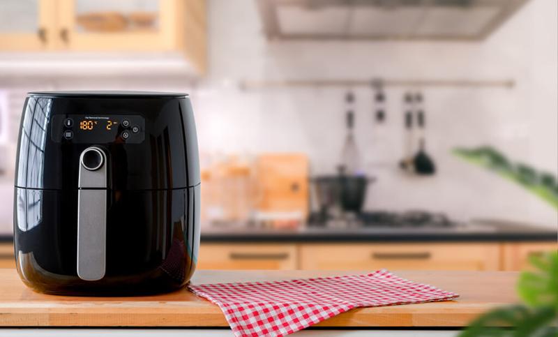 air fryer on worktop in kitchen