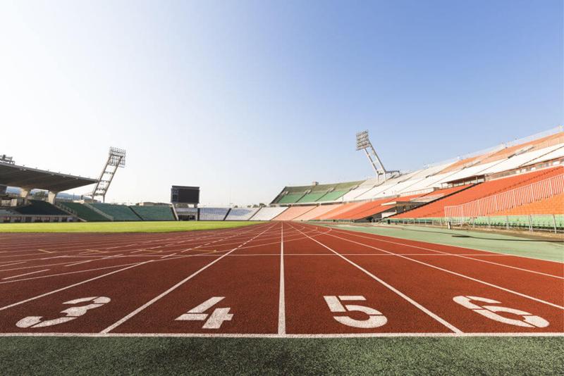 athletics track shot from the ground and the start of th elanes