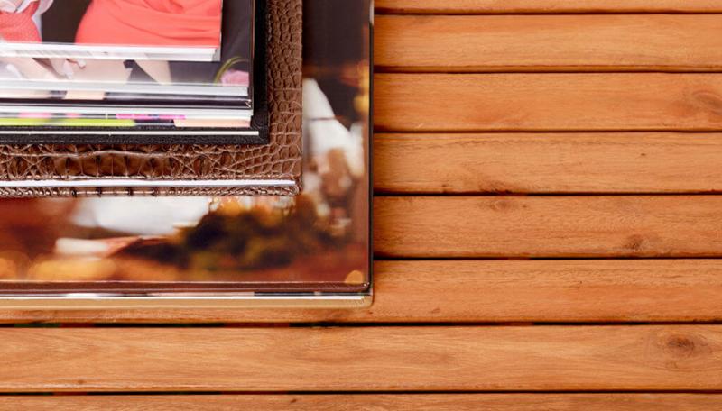 pile of books on wooden background