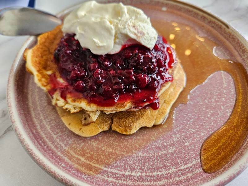 american pancakes with berries and cream