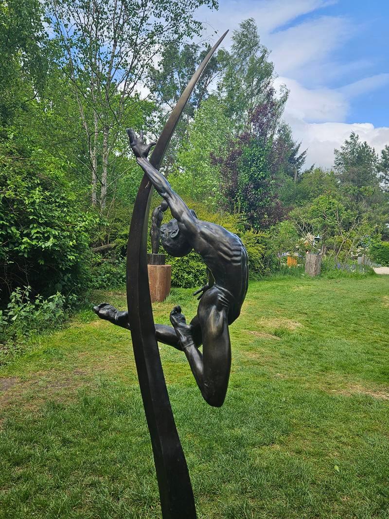 athletic posing man sculpture