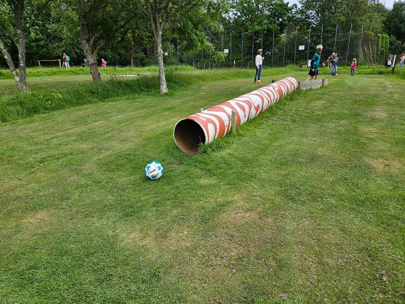 football through the footgolf tunnel