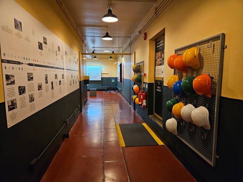 hard hats and displays in the bunkers at pk museum of global communications